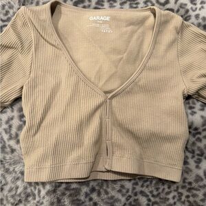 Tan garage long sleeve tight crop top.